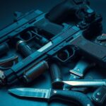 Police arrest scene with weapons and equipment used in kidnapping attempt, showcasing law enforcement action.