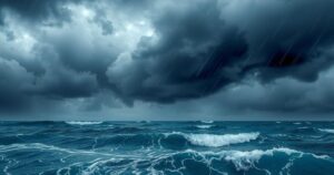 A swirling tropical storm system over water with heavy rain and wind, depicted in dark blues and grays.